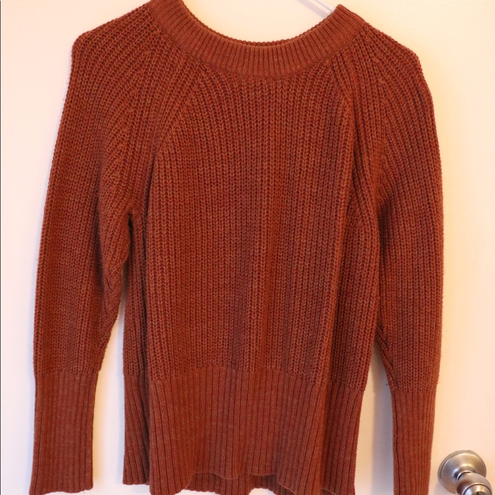 Scoop neck sweater.